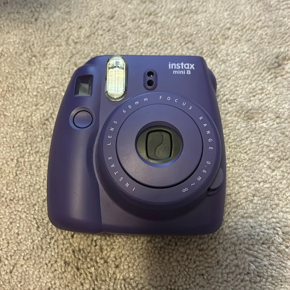 purple polaroid camera